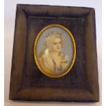 A late 19thC Continental oval head and shoulders portrait miniature,