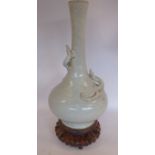 An early 20thC Chinese grey crackle glazed porcelain bottle vase of squat bulbous form,