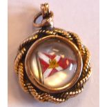 An 'antique' Essex crystal flag pendant in a 9ct gold rope effect frame,