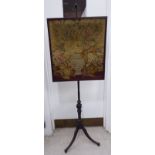 A late Regency mahogany polescreen,