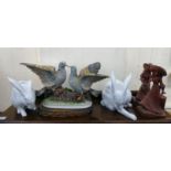 Decorative ceramics: to include a pair of white china seated hares 10''h RSM