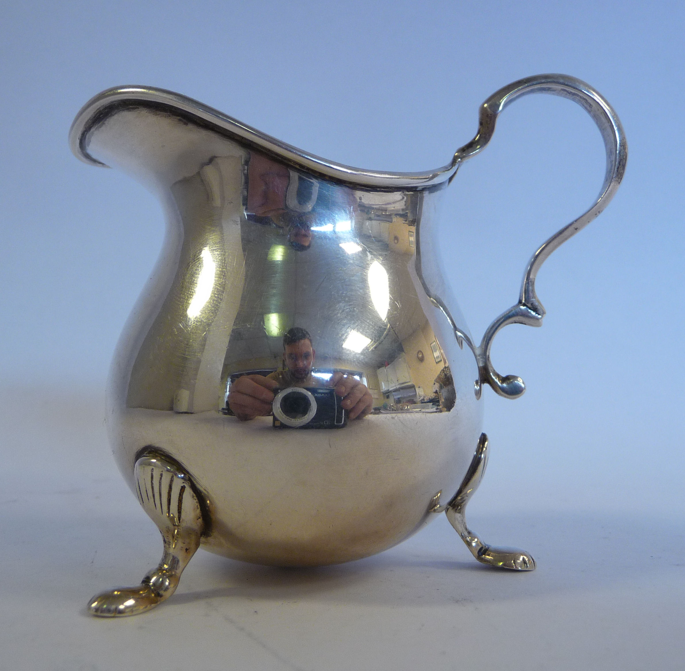 A Georgian style silver cream jug of waisted bulbous form with a flared, - Image 3 of 4