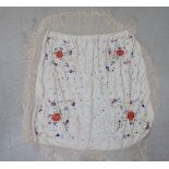 A Chinese multi-coloured floral embroidered and tasselled silk piano shawl CS