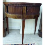 An early 19thC satinwood string inlaid mahogany demi-lune side table cabinet with a galleried tray