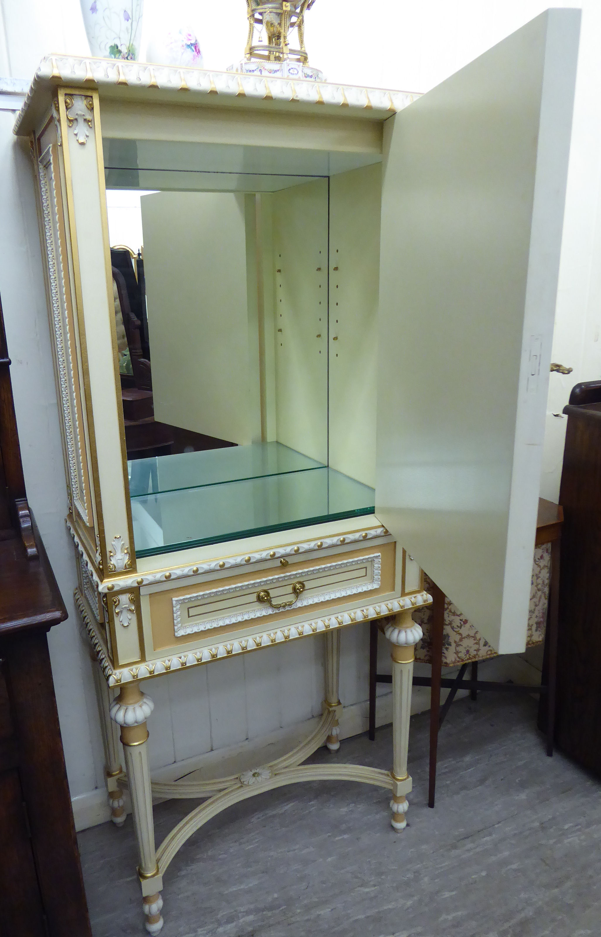 A modern Continental carved, gilded and painted cocktail cabinet with stiff leaf and other ornament, - Image 2 of 2