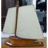 A mid 20thC novelty table lamp,