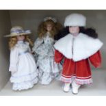 Three modern dressed dolls approx.