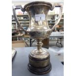 A twin handled silver trophy cup Birmingham 1930 8''h,