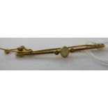 An 'antique' 9ct gold opal set bar brooch 11