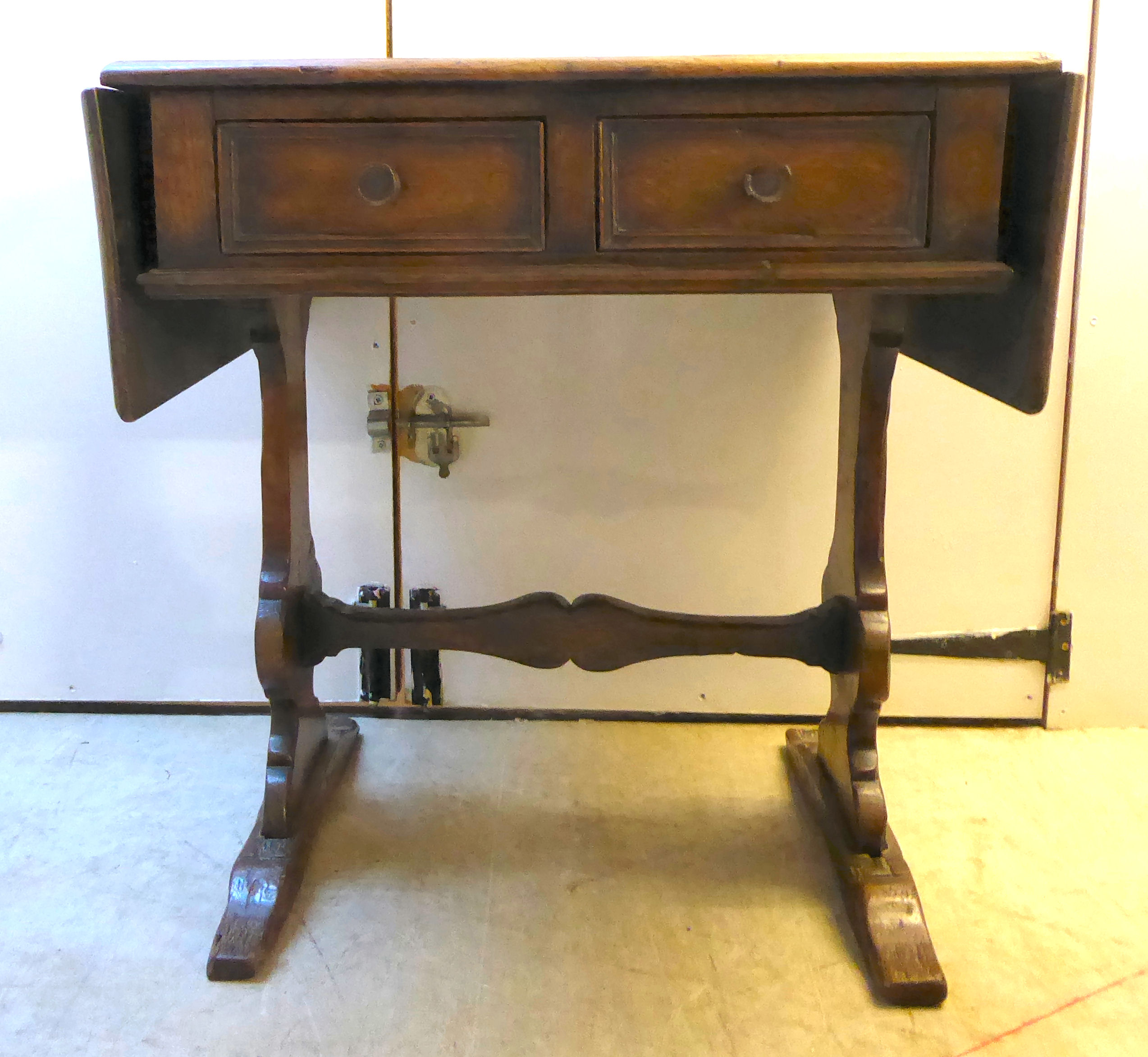 A reproduction of an 18thC country made oak Pembroke design table,