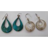 Two dissimilar pairs of silver drop earrings 11