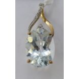A 9ct gold wire framed aquamarine and diamond set pendant 11