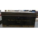 A black painted and gilded tinplate deed box with brass flank handles and a Chubbs Patent lock,