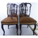 A set of four Edwardian mahogany framed salon chairs,