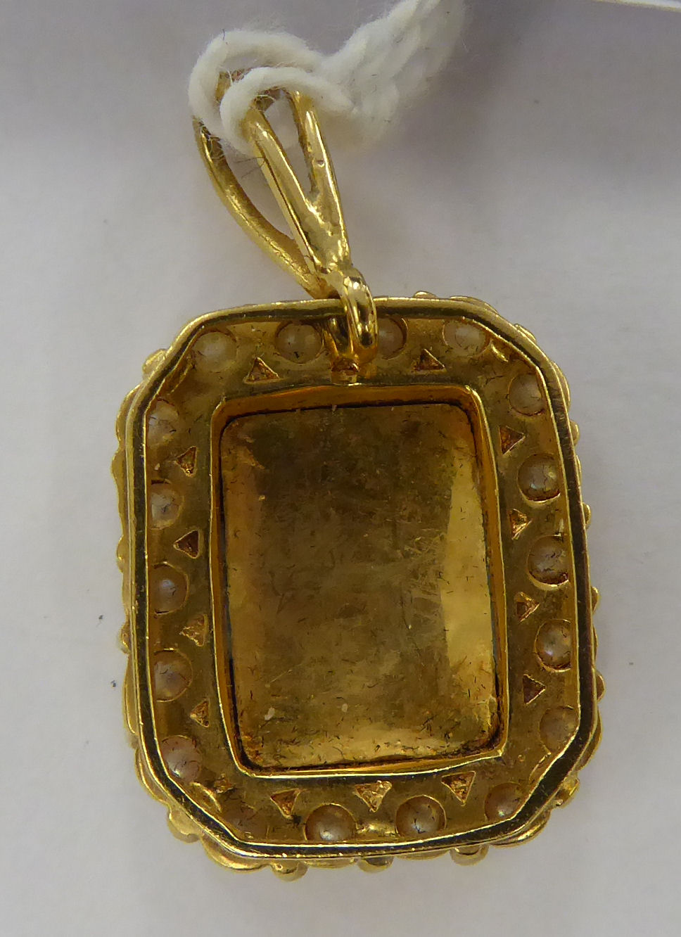 A gold coloured metal pendant, - Image 2 of 2