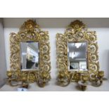 A pair of mid 19thC Continental style, elaborately cast and gilded iron girondoles,