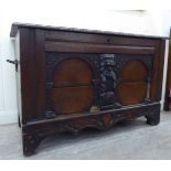A late 18th/early 19thC Continental boarded oak chest with straight sides,