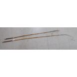 A Joseph Fletcher & Sons coaching whip and another similar with a bound hide handles,