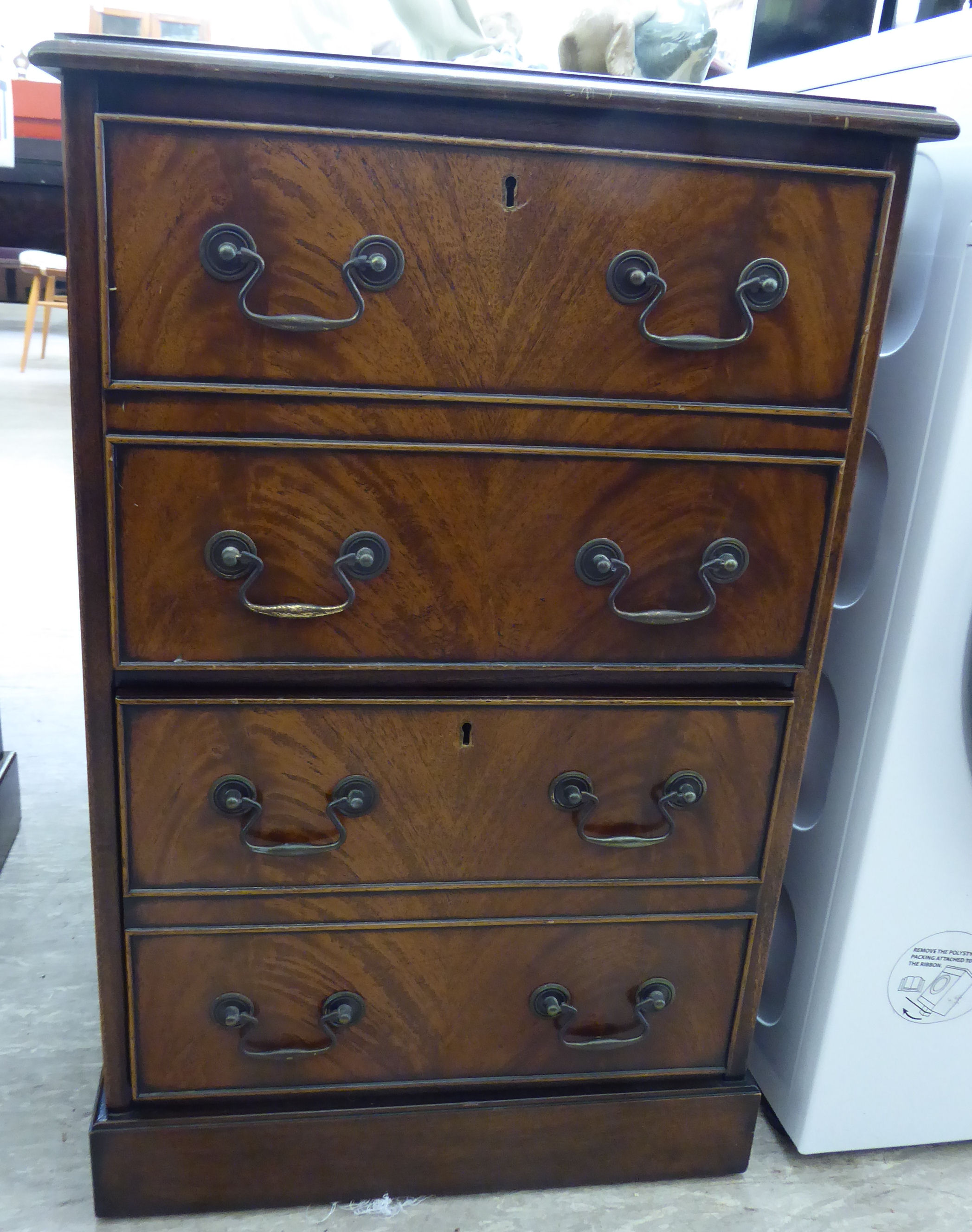 A modern mahogany finished two drawer filing cabinet,