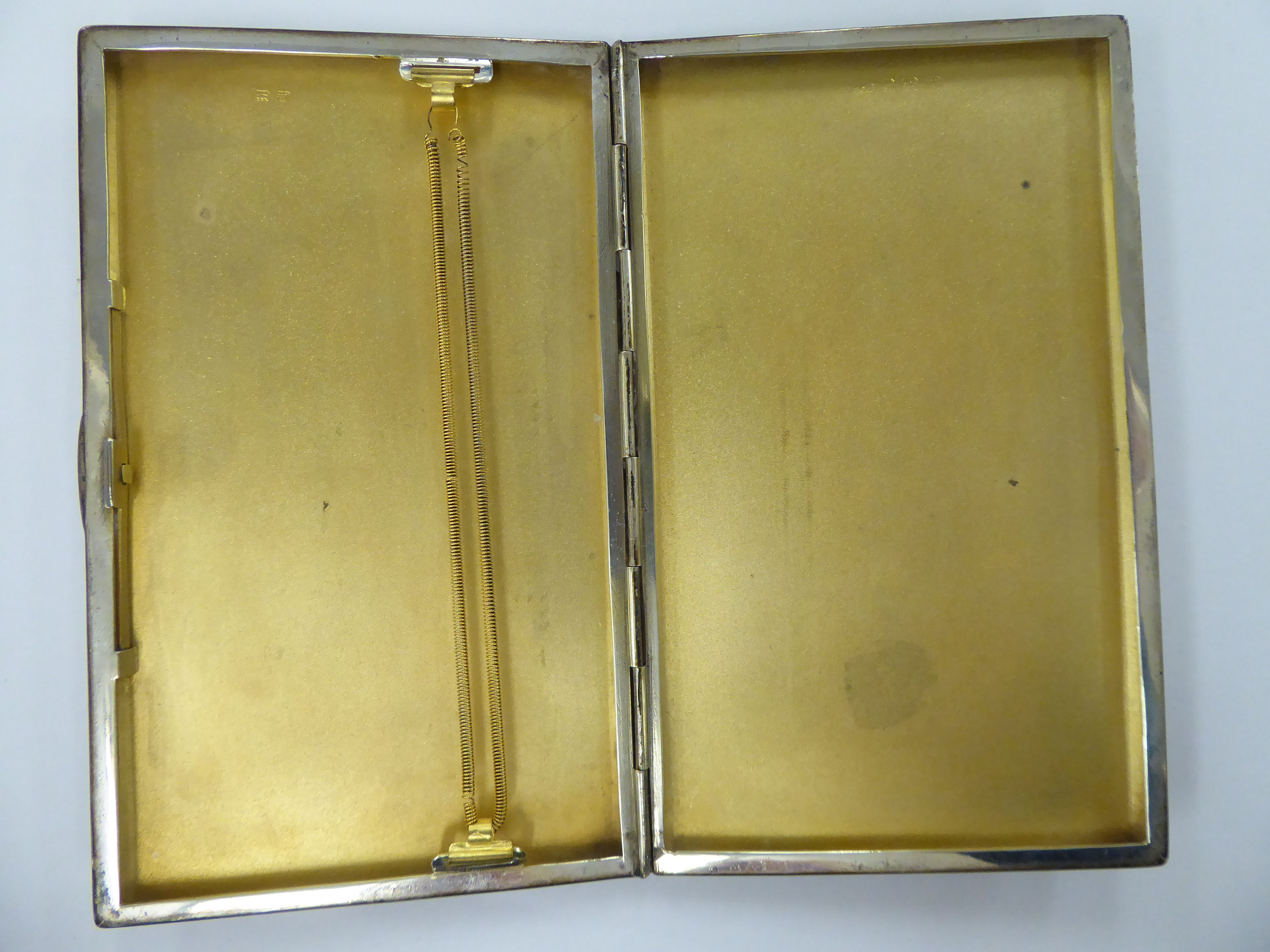 A silver folding cigarette case with engine turned decoration, - Image 2 of 2