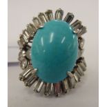 A white gold coloured metal turquoise and diamond set ring 11