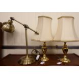 A pair of modern lacquered brass baluster vase design table lamps 10''h with cream coloured fabric