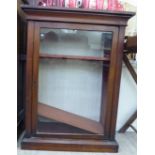 A late 19thC mahogany pier cabinet, the full-height,