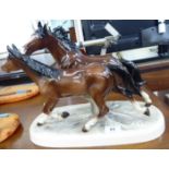 A Continental china model, two galloping horses,