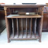 A late Victorian mahogany Canterbury with a two tiered superstructure,