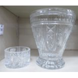 A Waterford Crystal vase of tapered form, on a splayed foot,