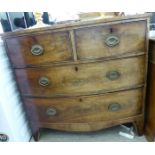 A Regency mahogany four drawer bow front dressing chest,