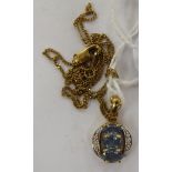 A 9ct gold blue topaz and diamond set pendant,