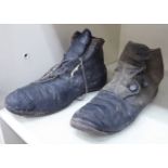 Two similar child's Victorian boots, one laced,