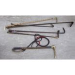 Six various riding crops: to include one with a horn handle and white metal ferrule LSF