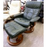 A modern green hide upholstered recliner chair,
