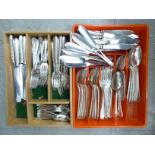 An extensive set of Mappin & Webb flatware and cutlery with bead bordered and ribbon tied stems