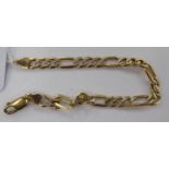 A 9ct white and yellow gold curb link bracelet 11