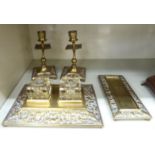 A late 19thC decoratively cast brass desk set,