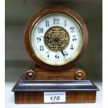 A late 19thC rosewood cased drum design mantel clock,