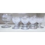 A set of nine 19thC diamond cut pedestal drinking glasses;