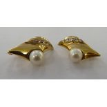 A pair of 18ct gold earrings,