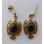A pair of 9ct gold and garnet set pendant earrings 11