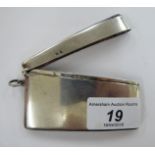 A silver curved card case with an angled, hinged cap,