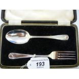 A silver Christening spoon and fork with bright-cut engraved stems Birmingham 1934 cased 11