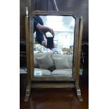 A late Victorian mahogany framed toilet mirror,