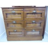 A Victorian style mahogany chest, comprising two in-line slides,