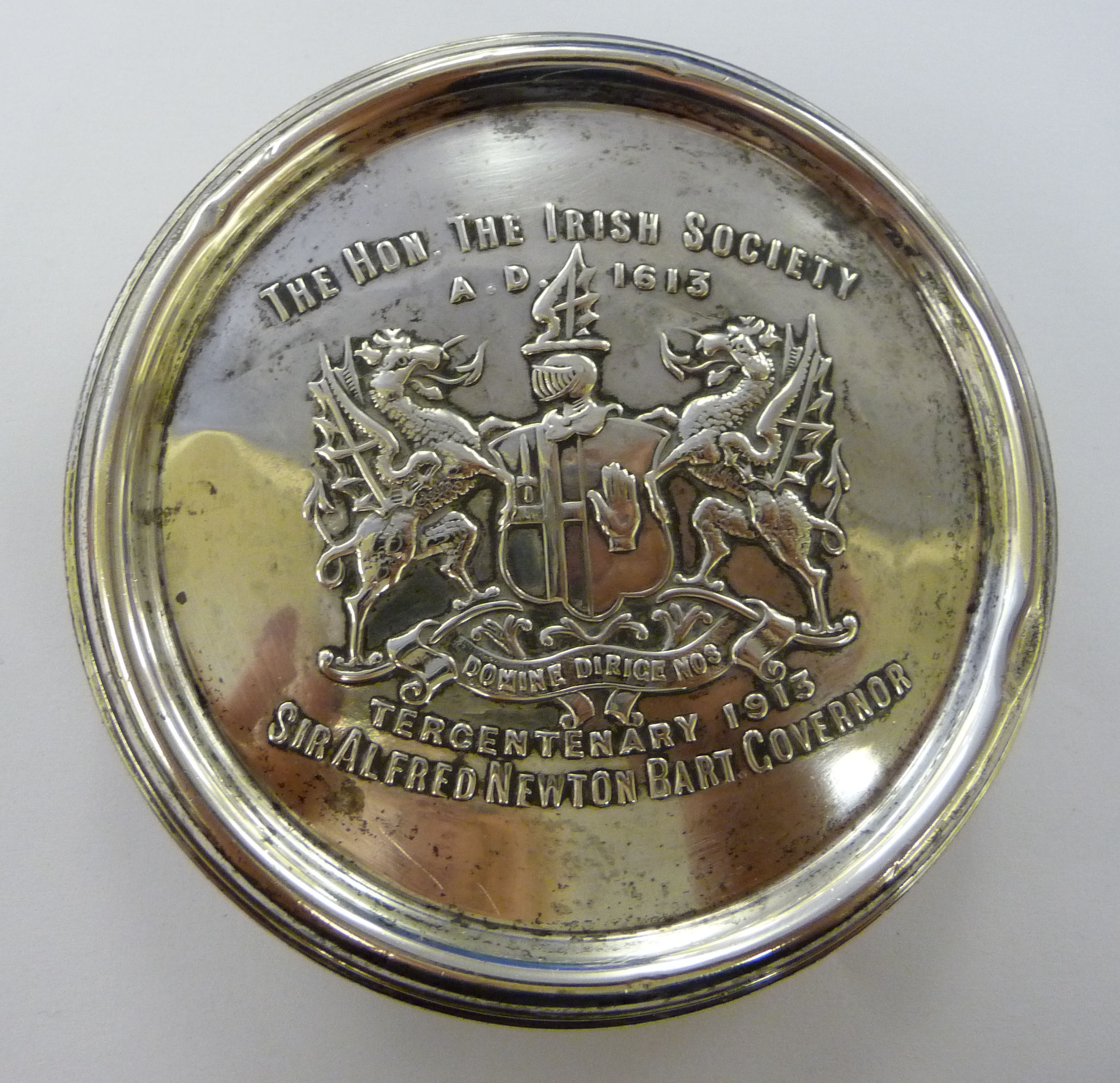 An early 20thC silver paperweight Chester 1912 bears a commemorative armorial for 'The Hon The