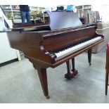 A Challen mahogany cased, iron framed boudoir grand piano, raised on square,