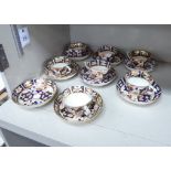 Seven mid Victorian Crown Derby china tea cups and eight matching saucers,