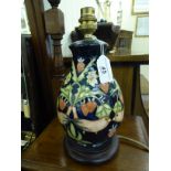 A modern Moorcroft pottery table lamp of ovoid form,